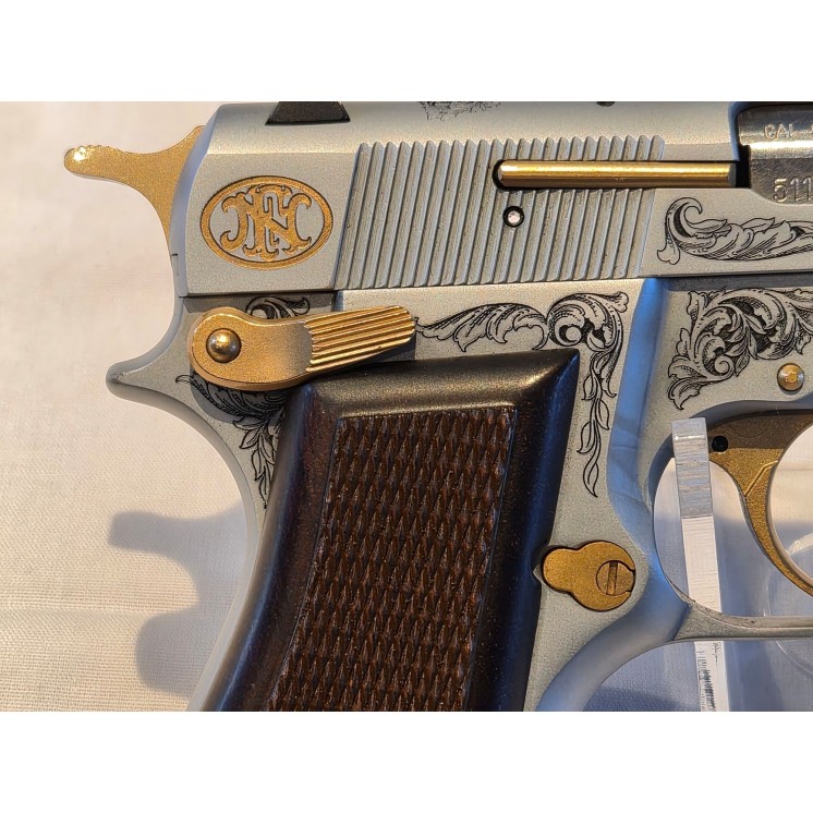 Très rare Pistolet FN GP 35 Browning Belgique le n°1 de la série limité anniversaire gravures et placage OR calibre 9x1 CAT B